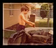 Tony Schroeder working on a motor - Age 10